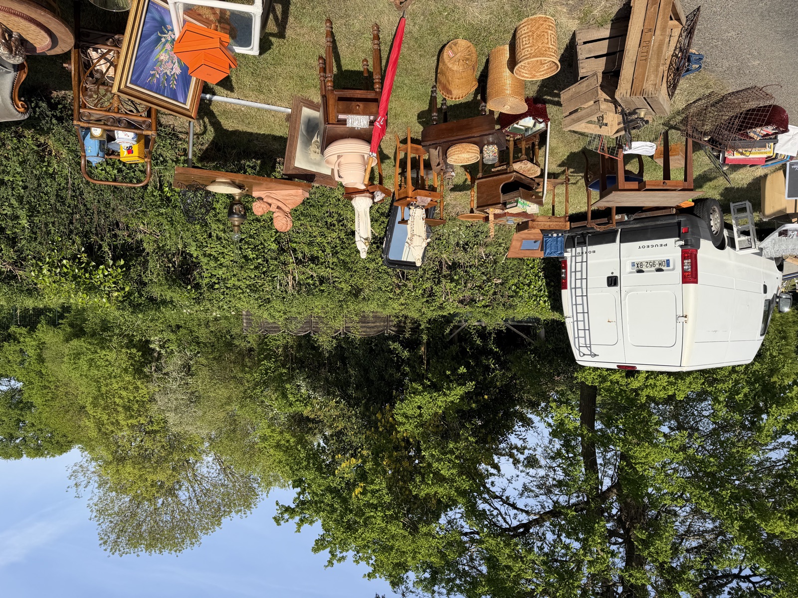 Dealer furniture lined up under the trees